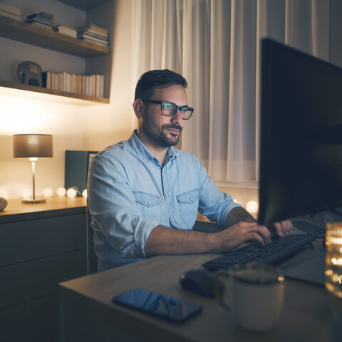man using laptop